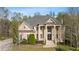 Stunning two-story home features large front columns and a meticulously landscaped yard at 4002 Moheb Sw St, Atlanta, GA 30331