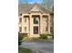 Elegant two-story home showcasing an impressive front entrance with stately columns at 4002 Moheb Sw St, Atlanta, GA 30331