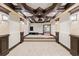 Basement home theater with coffered ceilings, stone columns and wall sconces at 4002 Moheb Sw St, Atlanta, GA 30331
