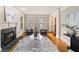 This living room offers a fireplace and hardwood floors at 4002 Moheb Sw St, Atlanta, GA 30331