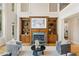 Elegant living room showcasing a fireplace, built-in shelving, and sophisticated decor at 4002 Moheb Sw St, Atlanta, GA 30331