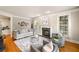 Bright living room features a fireplace, hardwood floors, and comfortable seating at 4002 Moheb Sw St, Atlanta, GA 30331