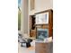 Fireplace with built-in shelves in a living room with elegant seating and decor at 4002 Moheb Sw St, Atlanta, GA 30331
