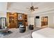 Spacious main bedroom with built in cabinetry, fireplace, and sitting area at 4002 Moheb Sw St, Atlanta, GA 30331