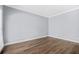 Bright, empty bedroom with fresh paint and hardwood floors at 4522 Willow Oak Trl, Powder Springs, GA 30127