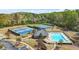 Resort-style community pool, tennis courts, and recreational area with inviting amenities at 4522 Willow Oak Trl, Powder Springs, GA 30127