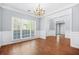 Large dining room featuring hardwood floors and a picture window at 4522 Willow Oak Trl, Powder Springs, GA 30127