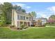 Spacious two-story home with brick and siding, complemented by a lush green lawn at 4522 Willow Oak Trl, Powder Springs, GA 30127