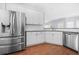 Spacious kitchen featuring stainless steel appliances and ample counter space at 4522 Willow Oak Trl, Powder Springs, GA 30127