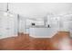 Spacious living area showcasing the open layout leading to the kitchen at 4522 Willow Oak Trl, Powder Springs, GA 30127