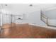 Open-concept living area with views of the kitchen and staircase at 4522 Willow Oak Trl, Powder Springs, GA 30127