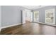 Well-lit office space with hardwood floors, and double french doors at 4522 Willow Oak Trl, Powder Springs, GA 30127