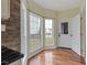 Sunny breakfast nook with large windows and hardwood floors at 475 Brown Thrasher Ct, Alpharetta, GA 30009