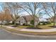 Inviting home with beautiful landscaping, mature trees, and a well-maintained lawn in a desirable neighborhood at 475 Brown Thrasher Ct, Alpharetta, GA 30009