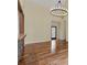 Bright living room with hardwood floors, high ceilings, and modern lighting at 475 Brown Thrasher Ct, Alpharetta, GA 30009