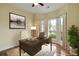 Office featuring hardwood floors, neutral walls, and a large window at 475 Brown Thrasher Ct, Alpharetta, GA 30009