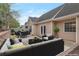 Backyard patio with outdoor seating and dining area at 475 Brown Thrasher Ct, Alpharetta, GA 30009