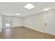 Spacious basement featuring wood-look flooring, access to the outdoors, and plenty of storage space at 60 Riverside Pkwy, Sharpsburg, GA 30277