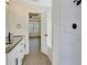Bright bathroom featuring a granite-topped vanity and tiled shower at 60 Riverside Pkwy, Sharpsburg, GA 30277