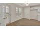 Cozy dining area with french doors and a window that brings in natural light at 60 Riverside Pkwy, Sharpsburg, GA 30277