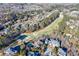 Expansive aerial view of a distinguished property overlooking a manicured golf course and luxury homes at 2281 Bransley Pl, Duluth, GA 30097