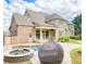 Backyard featuring a swimming pool, patio, and landscaped grounds at 2281 Bransley Pl, Duluth, GA 30097