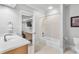 Neutral bathroom with a shower-tub combo, a spacious vanity, and access to an exercise room at 2281 Bransley Pl, Duluth, GA 30097