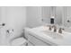 Bathroom featuring a white vanity, granite counters, a brushed-nickel faucet, and a nearby toilet at 2281 Bransley Pl, Duluth, GA 30097