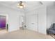 Spacious bedroom with neutral colors, and doors leading to a bathroom and closet at 2281 Bransley Pl, Duluth, GA 30097