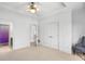 Expansive bedroom with neutral carpet, white walls, and a pair of closets at 2281 Bransley Pl, Duluth, GA 30097