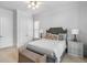 Comfortable bedroom with neutral colors and a charming window seat at 2281 Bransley Pl, Duluth, GA 30097