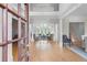 Grand foyer featuring gleaming hardwood floors, high ceilings, and elegant architectural details at 2281 Bransley Pl, Duluth, GA 30097
