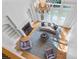 Open-concept living room with a fireplace, built-in shelves, and large windows for natural light at 2281 Bransley Pl, Duluth, GA 30097