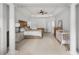 Large main bedroom showcases tray ceilings, columns, and ample natural light from several windows at 2281 Bransley Pl, Duluth, GA 30097