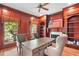 Elegant home office featuring custom wood trim, fireplace, and built-in bookshelves at 2281 Bransley Pl, Duluth, GA 30097