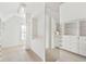 Bright, walk-in closet with custom shelving and ample storage space at 2281 Bransley Pl, Duluth, GA 30097