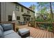 Wooden deck with outdoor seating and dining areas, perfect for entertaining at 4688 Oakleigh Manor Dr, Powder Springs, GA 30127