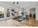 Bright exercise room with fitness equipment and French doors leading to an outdoor deck at 4688 Oakleigh Manor Dr, Powder Springs, GA 30127