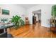 Inviting living room with hardwood floors and seamless flow to the adjacent rooms and spaces at 4688 Oakleigh Manor Dr, Powder Springs, GA 30127