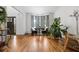 Bright living room with hardwood floors, bay window, and comfortable seating area for relaxation at 4688 Oakleigh Manor Dr, Powder Springs, GA 30127