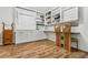 Home office with built-in shelving and a desk, providing a functional workspace at 4688 Oakleigh Manor Dr, Powder Springs, GA 30127