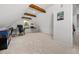 Spacious office area with high ceilings, a modern desk setup, and soft carpeting, ideal for a productive work environment at 4688 Oakleigh Manor Dr, Powder Springs, GA 30127