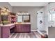 This updated bathroom features a vanity with ample storage and countertop space and a glass enclosed shower at 6585 Queen Mill Se Rd, Mableton, GA 30126