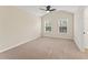 Inviting bedroom featuring soft carpeting and natural light from the double windows at 122 Crestmont Dr, Canton, GA 30114