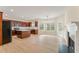 A modern kitchen with cherry wood cabinets, stainless steel appliances, and an island perfect for entertaining at 122 Crestmont Dr, Canton, GA 30114