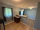 Bright kitchen featuring a tile floor, stainless steel appliances, a breakfast bar, and lots of natural light at 1464 Colony East Cir, Stone Mountain, GA 30083