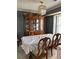 Formal dining room featuring a large table and decorative hutch at 230 Blue Heron Dr, Jonesboro, GA 30238