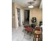 Open kitchen and dining area with bright lighting and tile flooring at 230 Blue Heron Dr, Jonesboro, GA 30238