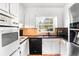 Functional kitchen equipped with essential appliances and ample cabinet space at 2442 Wentworth Ne Dr, Atlanta, GA 30345