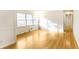 Bright living room features hardwood floors and large windows offering plenty of natural light at 2442 Wentworth Ne Dr, Atlanta, GA 30345